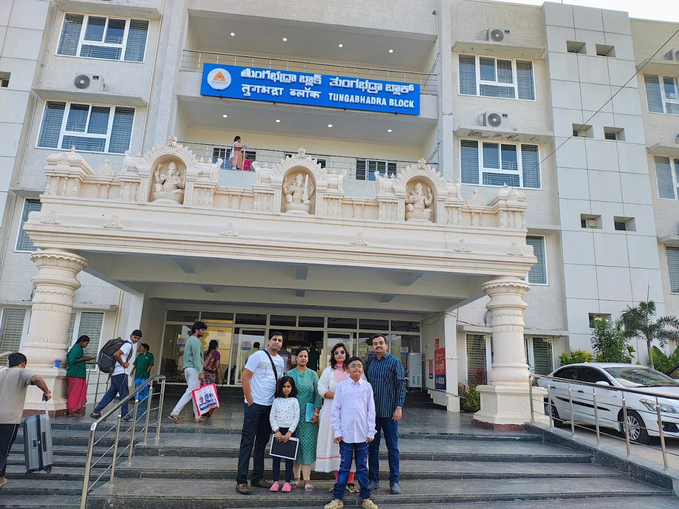 Tungabhadra Block guest house entrance in Srisailam with pilgrims and family visitors